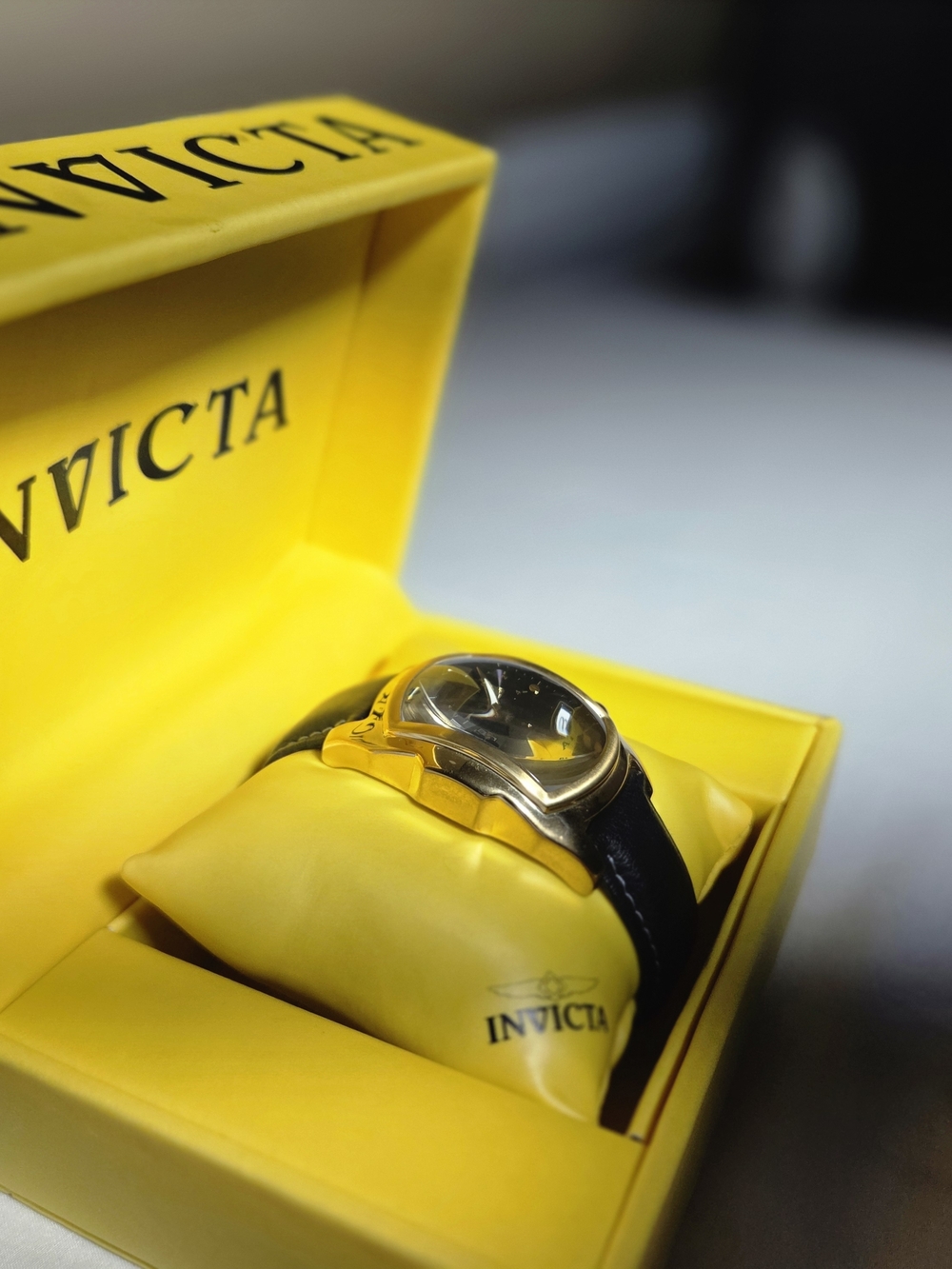 Invicta Gold-Tone Watch with Black Strap